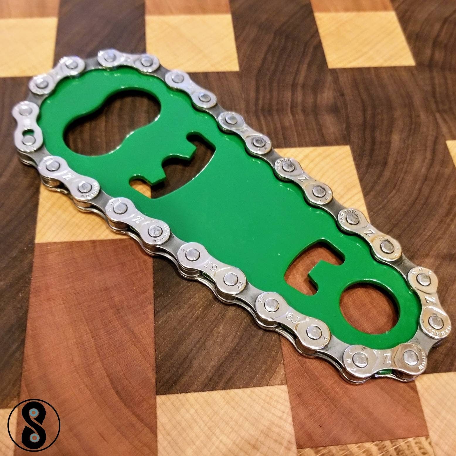 Hand Made reclaimed upcycled sustainable bike chain bottle opener.